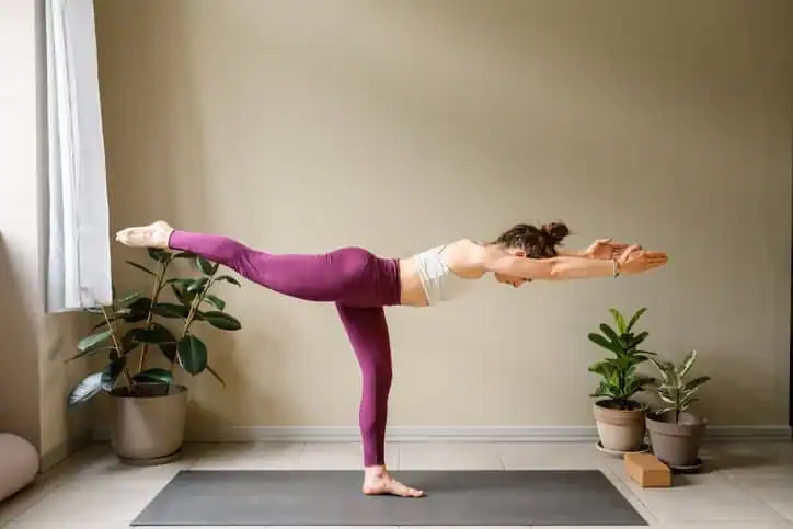 Woman doing Yoga exercise Littlehampton to help with toning the body. 