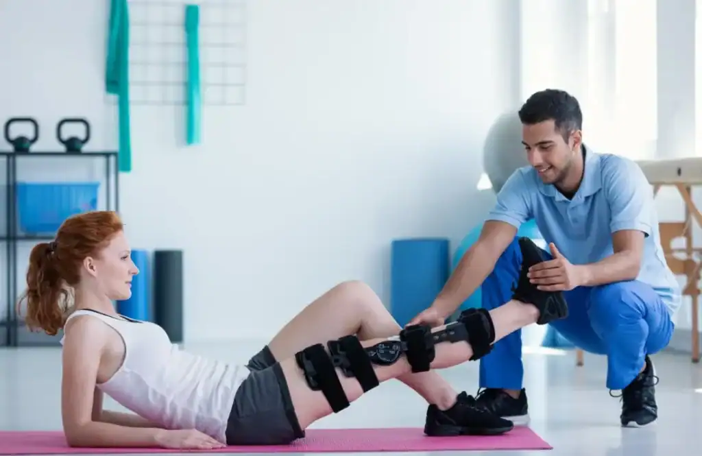 Debunking Meal Timing Myths: The Truth About Muscle Recovery 1 Woman having treatment to help muscle recovery Littlehampton after an injury