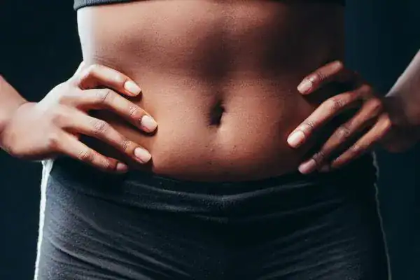 Toning Your Stomach: The Ultimate Guide to Achieving a Sculpted Stomach While Shedding Pounds 1 Image of a toned stomach after non surgical treatment Littlehampton